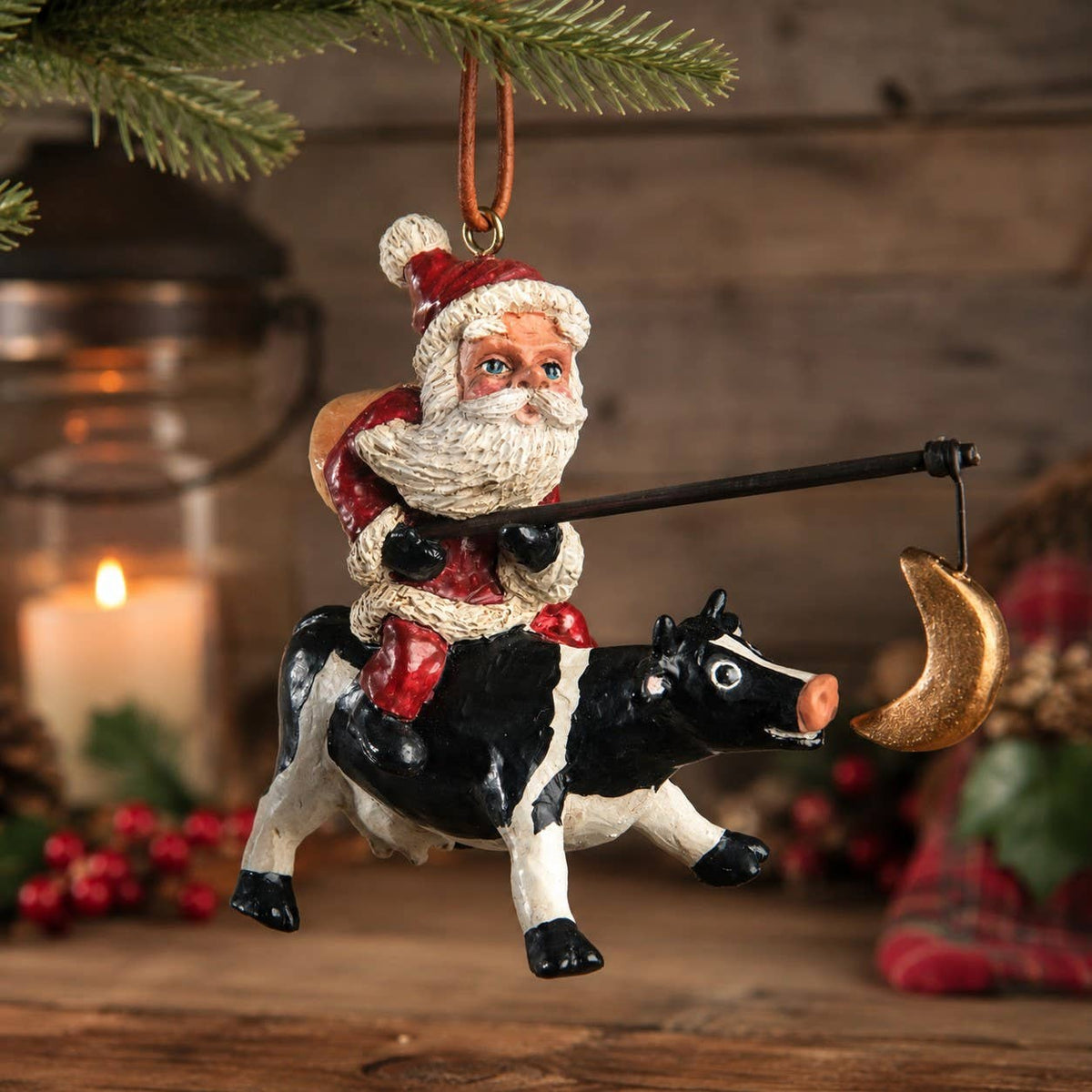 Santa Riding a Cow Ornament